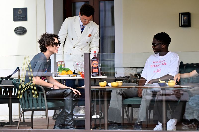 venice-film-festival-2022---images-Timothée_Chalamet_and_Stéphane_Bak_Spotted_Drinking_MARTINI_Fiero___Tonic_at_the_Arts_Bar_at_The_St._Regis_Venice_Ahead_Of_Venice_International_Film_Festival_–_Sept_1,_2022_-_2_CREDIT_COBRATEAM_BACKGRID(1)_(1).jpg